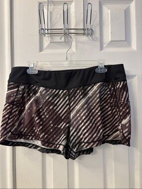 Athleta Women's Black & Dark Plum Striped Athletic Shorts with zip back pocket